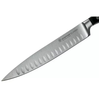 Wusthof Classic carving knife with hollow edge 23 cm. black Buy on Shopdecor WÜSTHOF collections